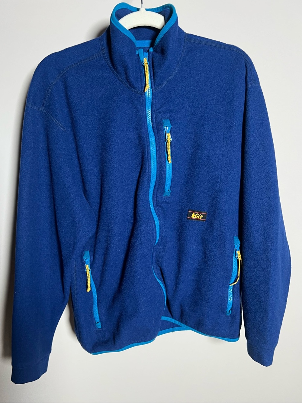 REI Royal Blue Polartec Fleece Jacket with Teal Trim and Yellow Pulls